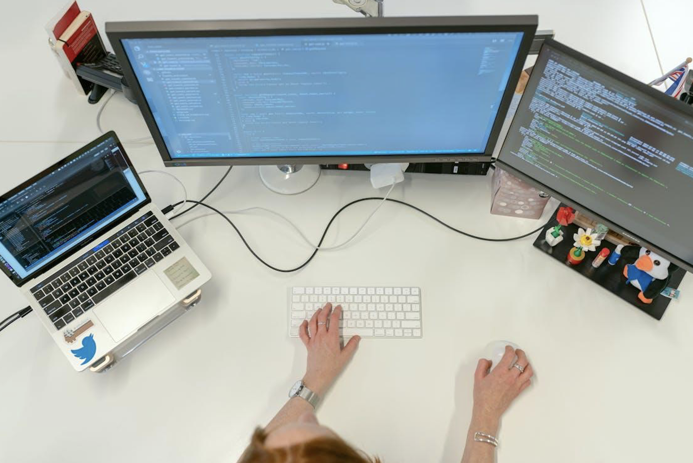 an individual working on their computer